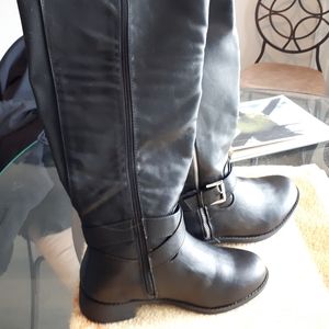 Torrid over the knee buckle and zipper boots.